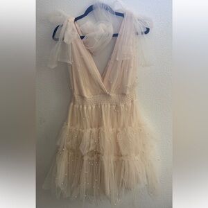 Cream colored pearl mini dress